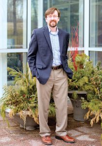 Person stands outside in blue blazer