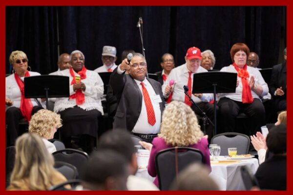 Chorus performs in a conference ball room